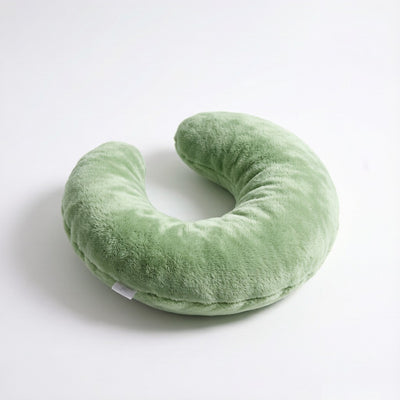 Crescent-shaped green plush dog pillow - product